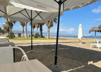 The local beach bar is steps away